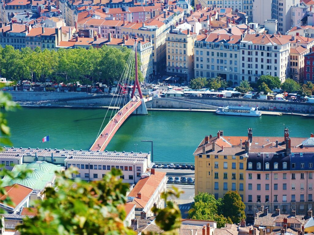 a view of a bridge over a river in a city