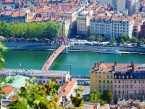 a view of a bridge over a river in a city